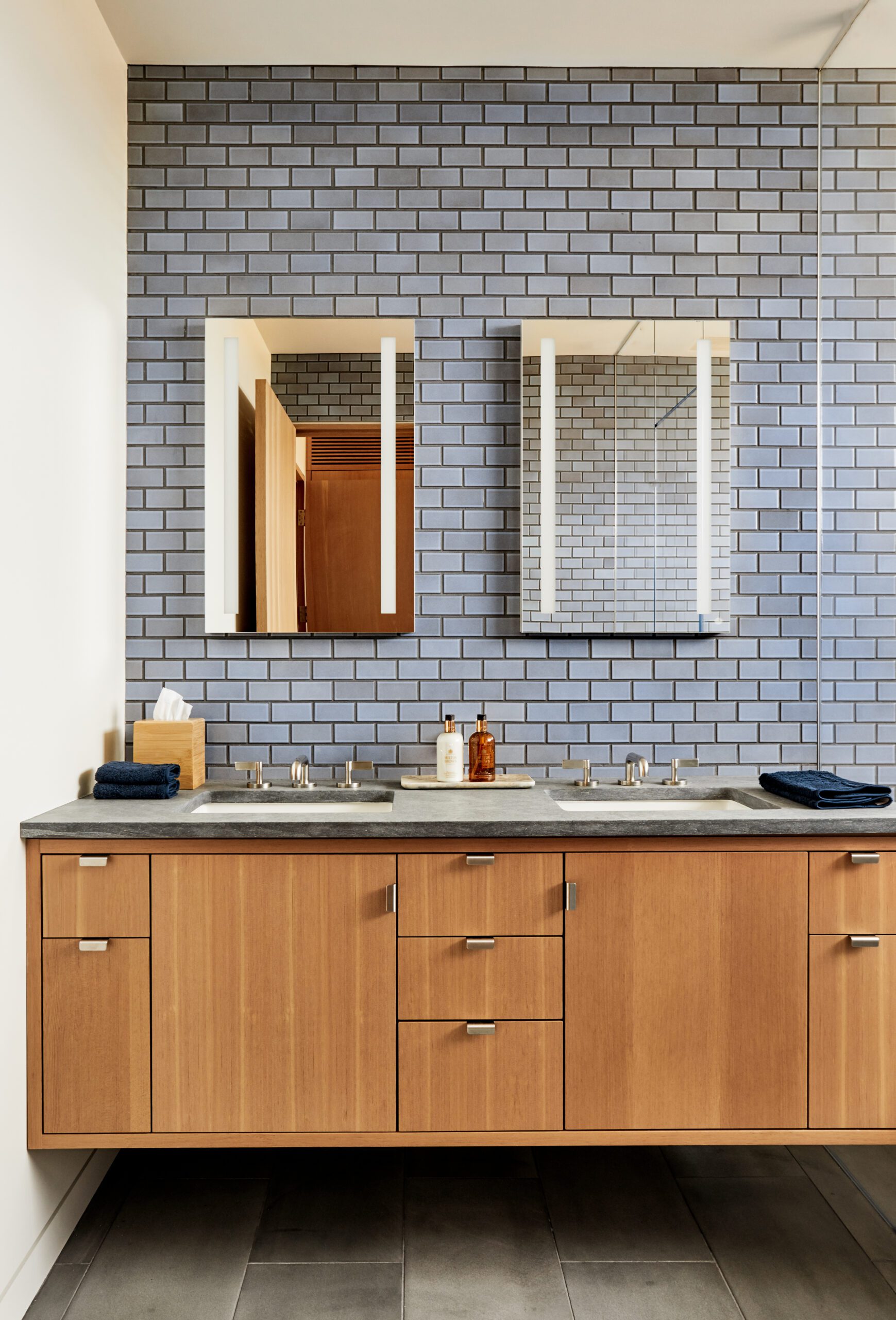 Midcentury modern home design bathroom blue wall tile