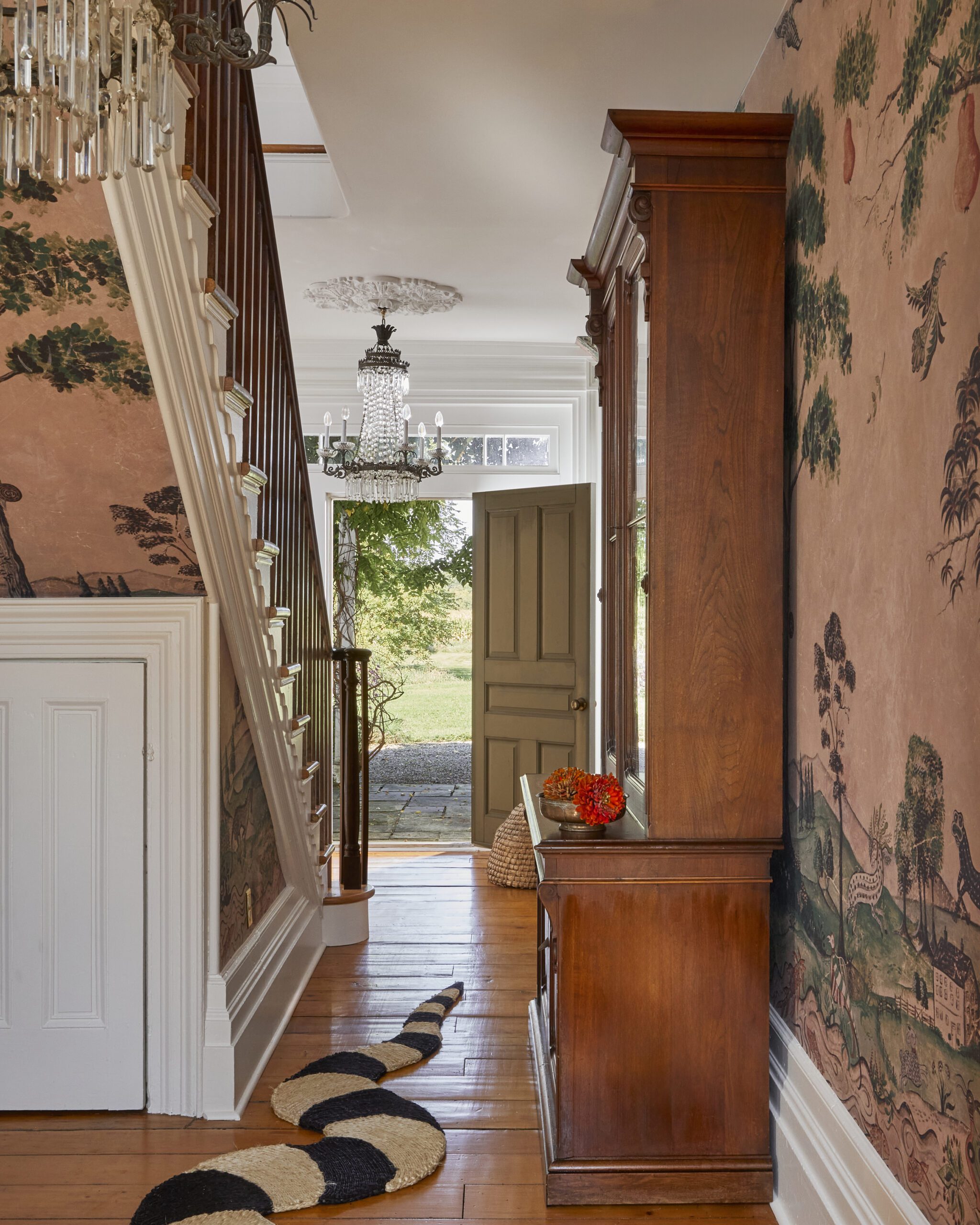 Fairytale wallpaper entryway snake rug
