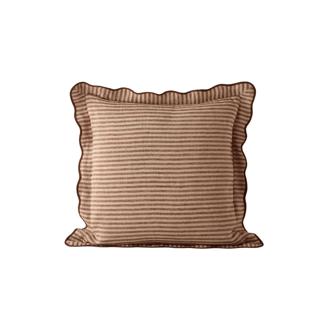 Striped throw pillow with ruffle edges