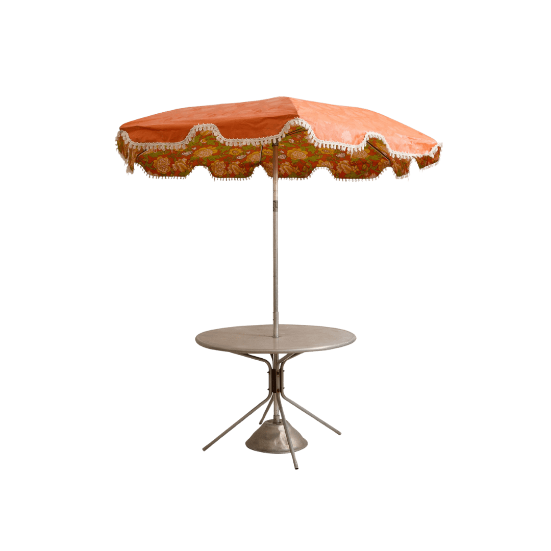 Orange vintage umbrella outdoor table