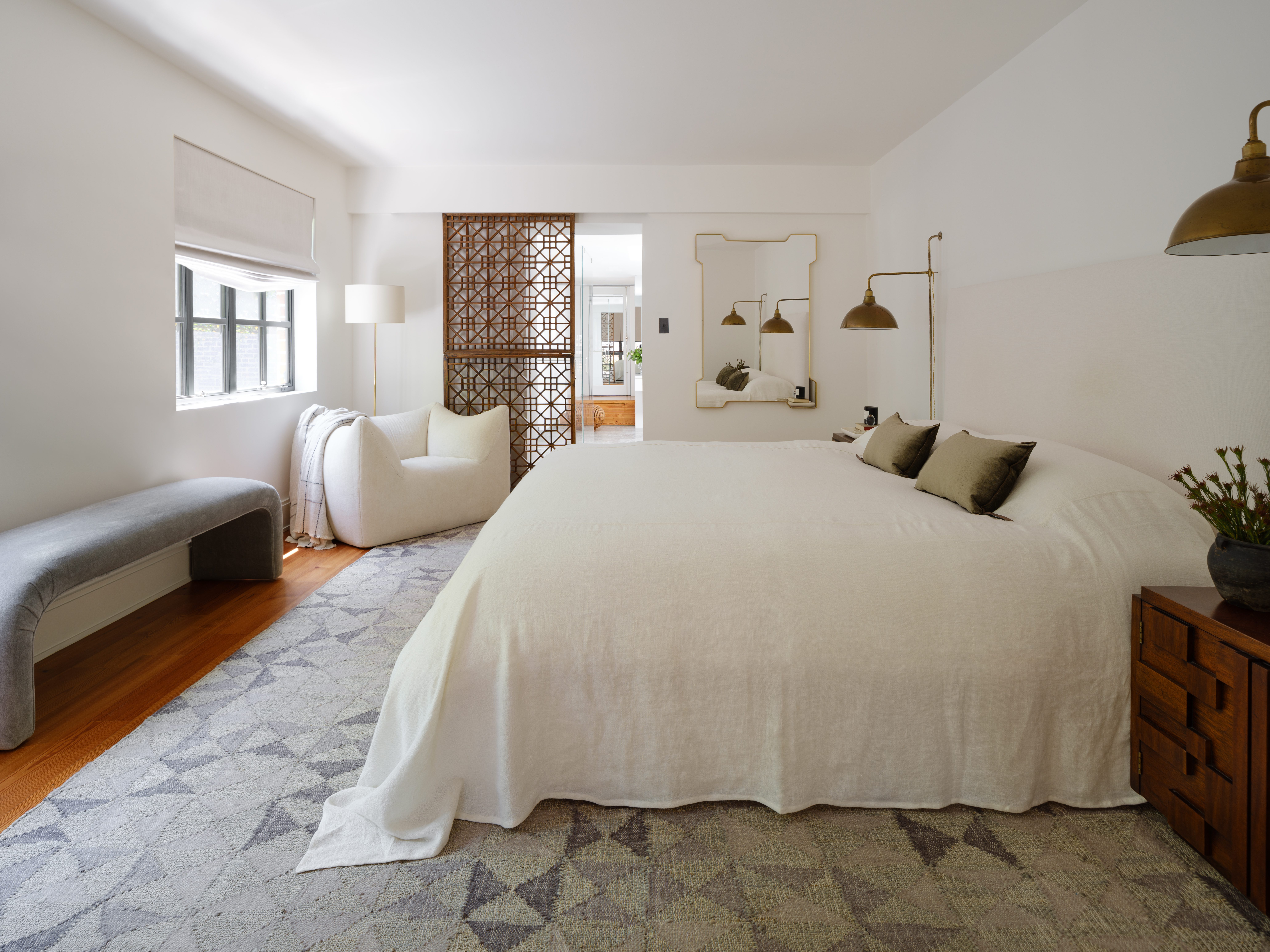 Wide angle bedroom shot with modern details