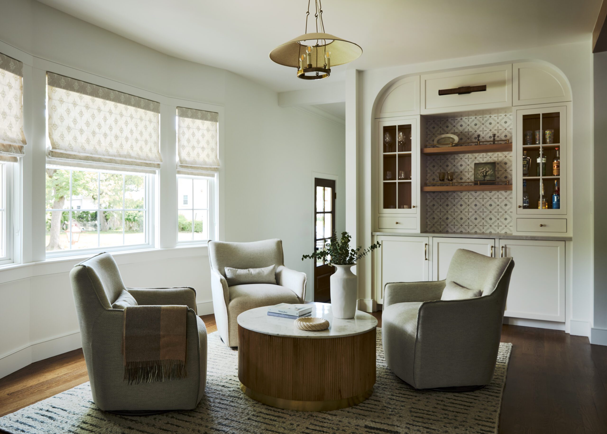 Seating area in living room cream walls