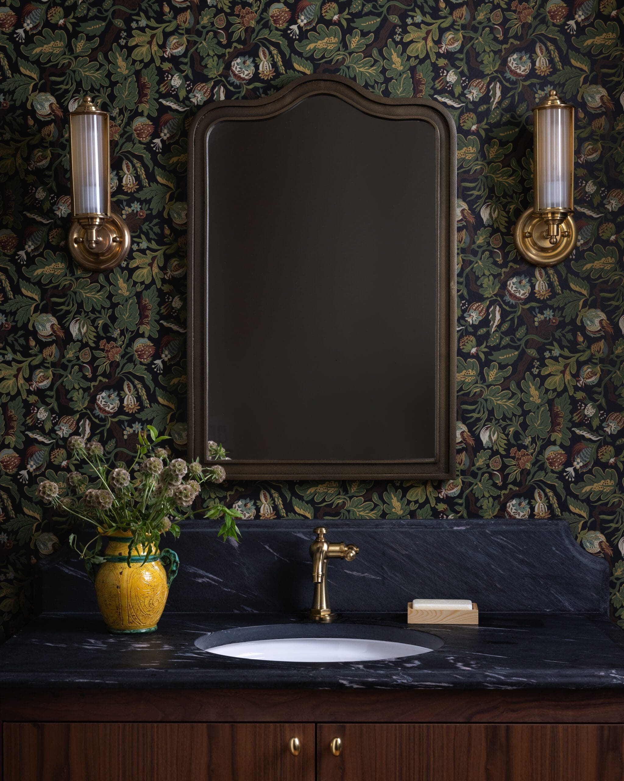 Floral wallpapered powder room