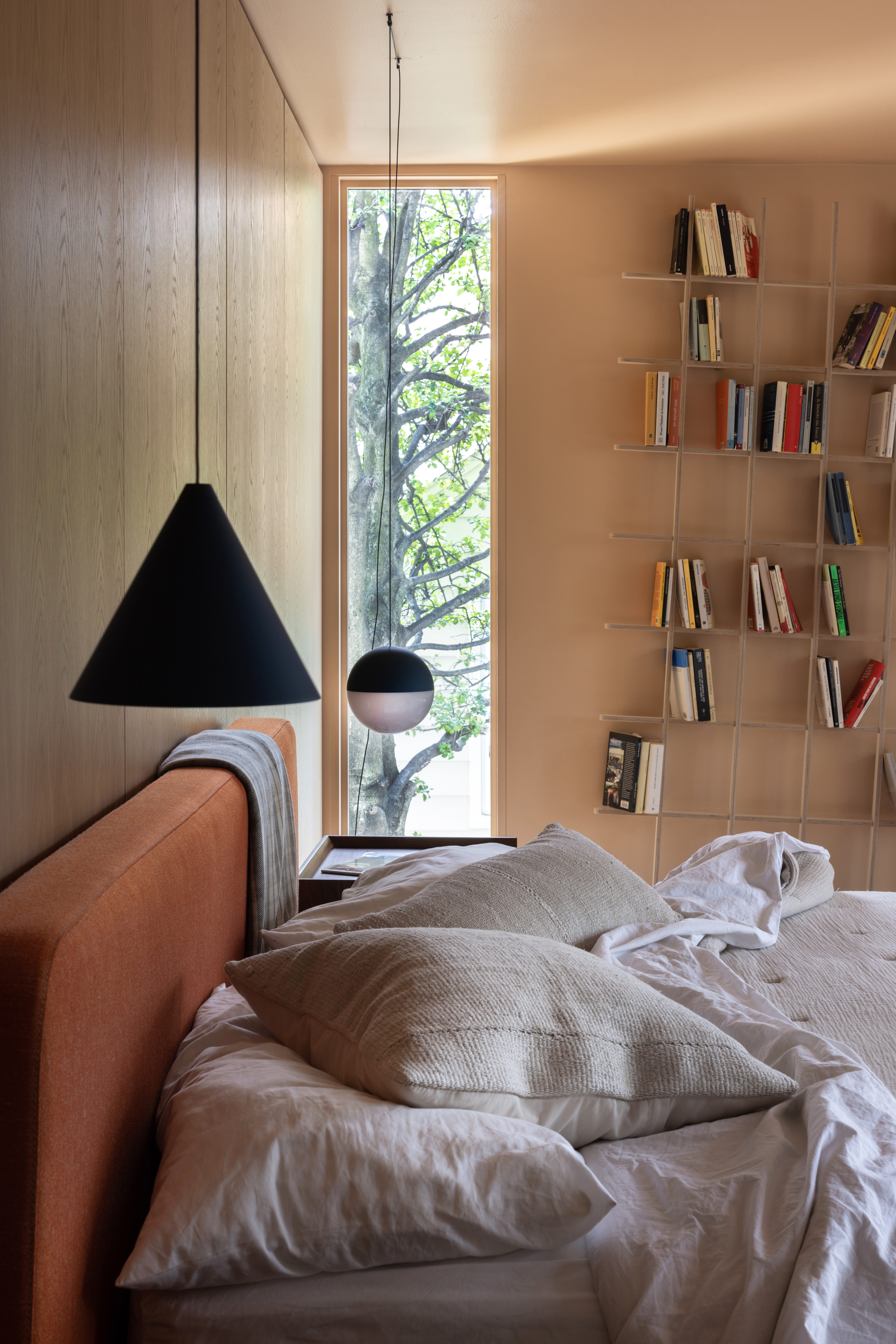 Mid century modern bedroom with bookcase