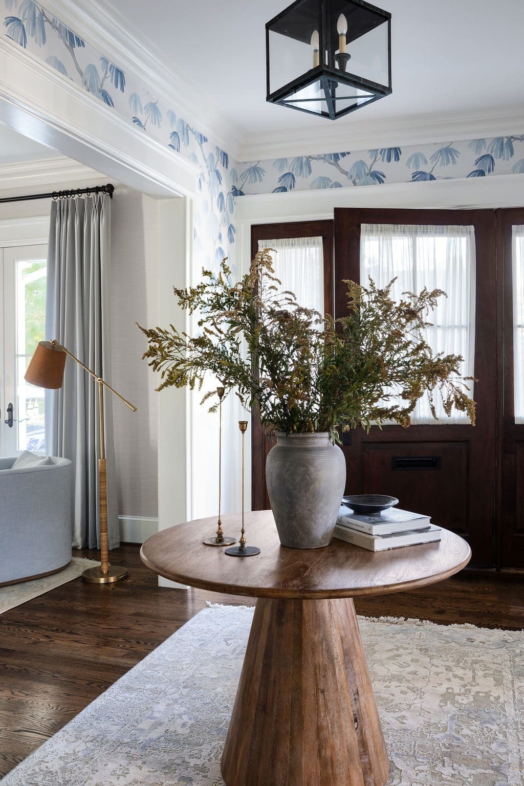 Entryway with blue wallpaper