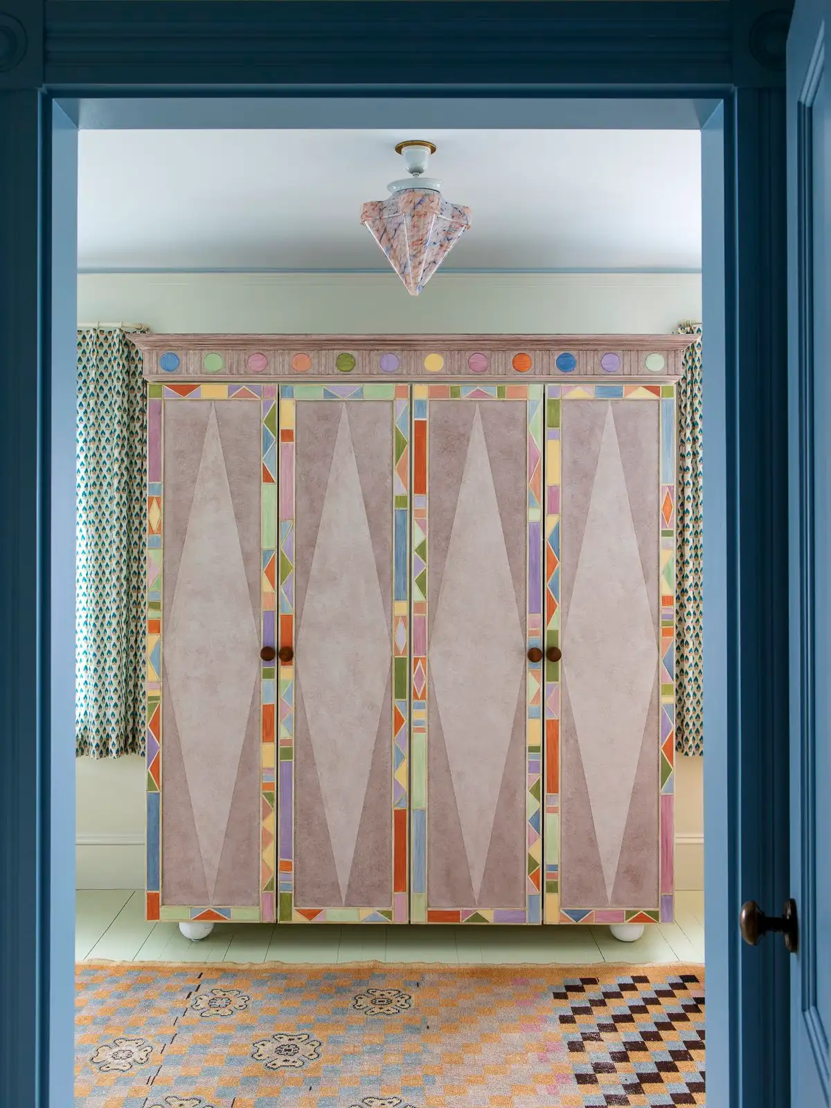 Colorful armoire hand painted One Weird Thing