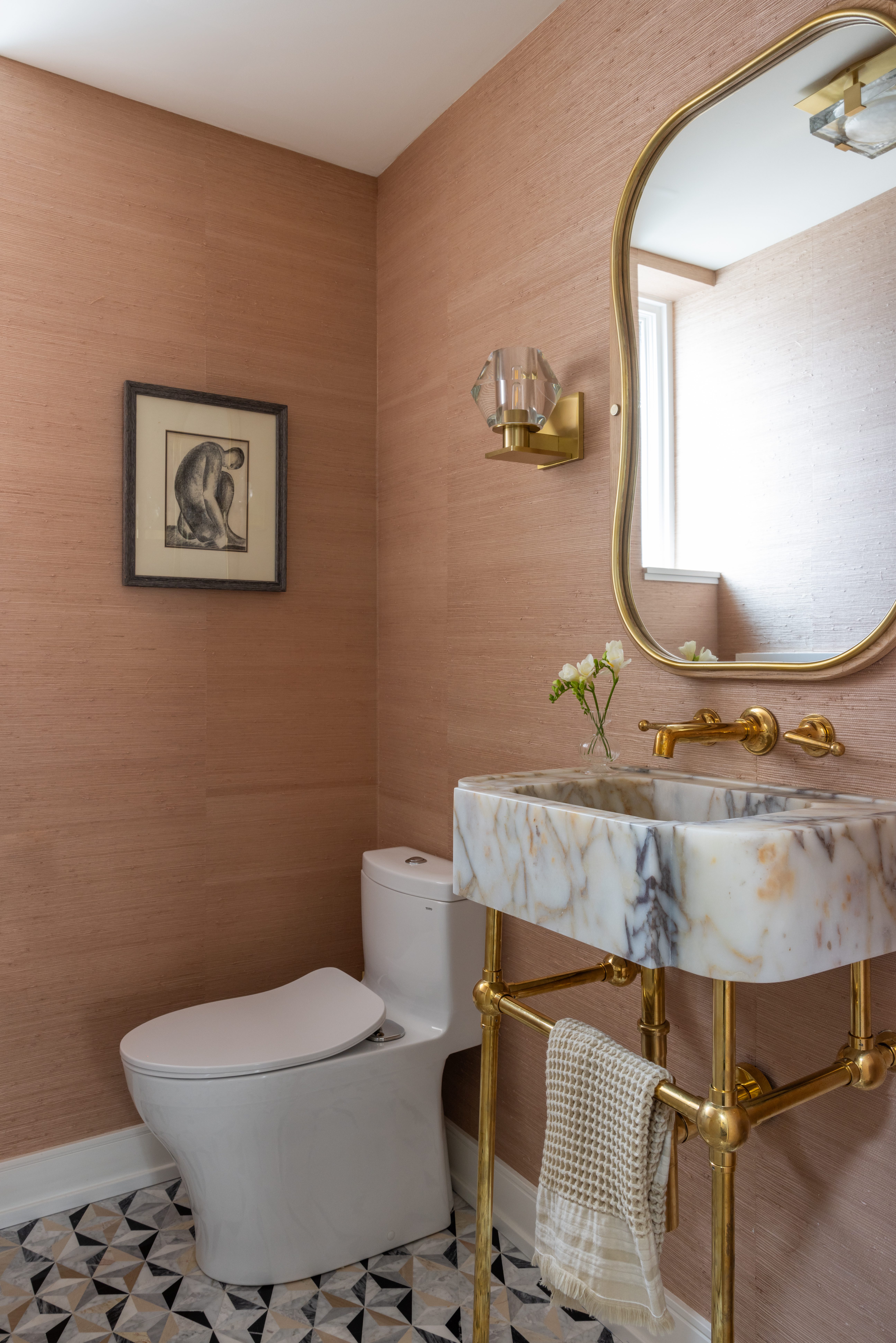 Pink wallpaper poweder room