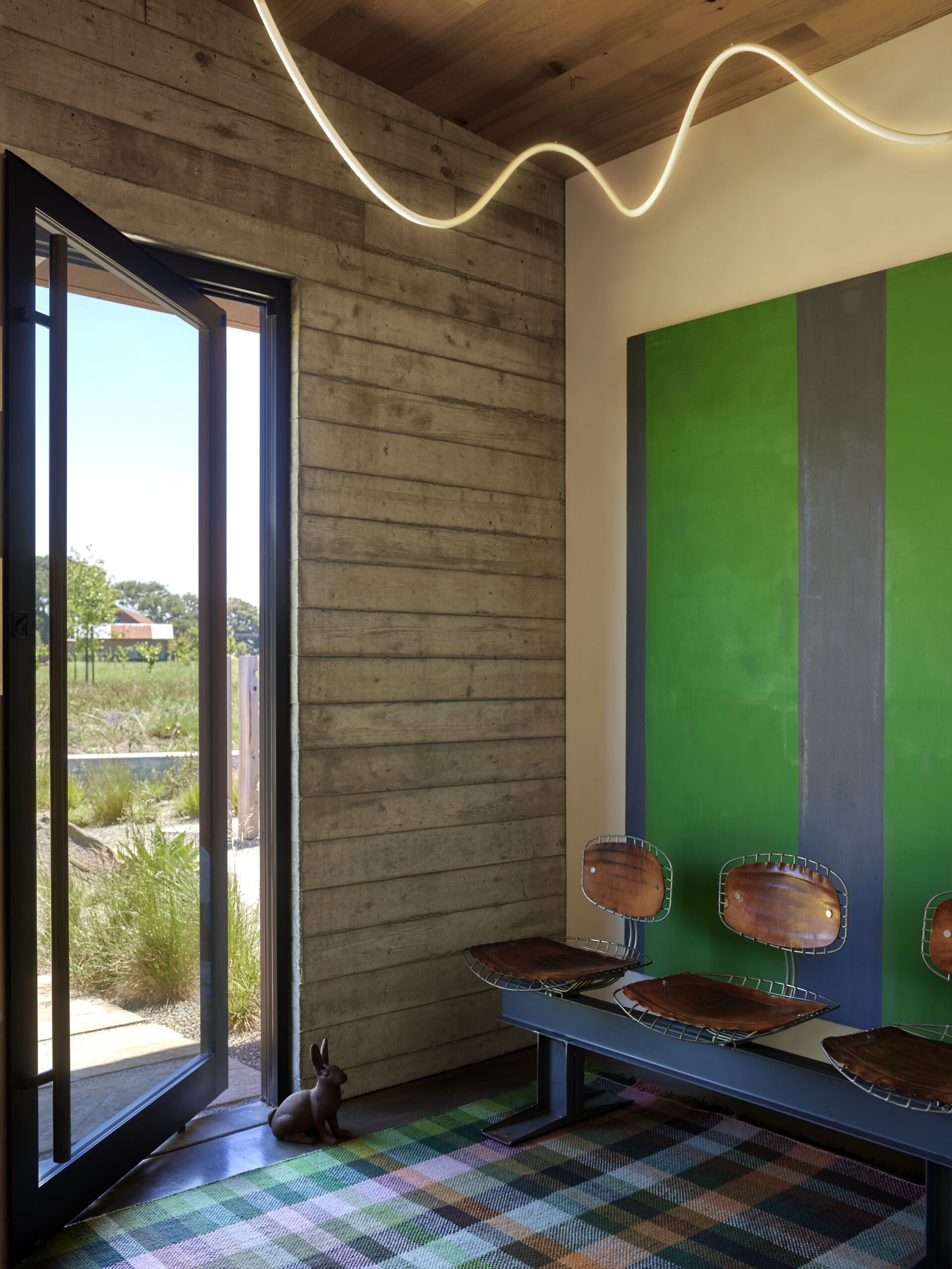 Colorful entryway Refined Camp Occidental Regan Baker Design