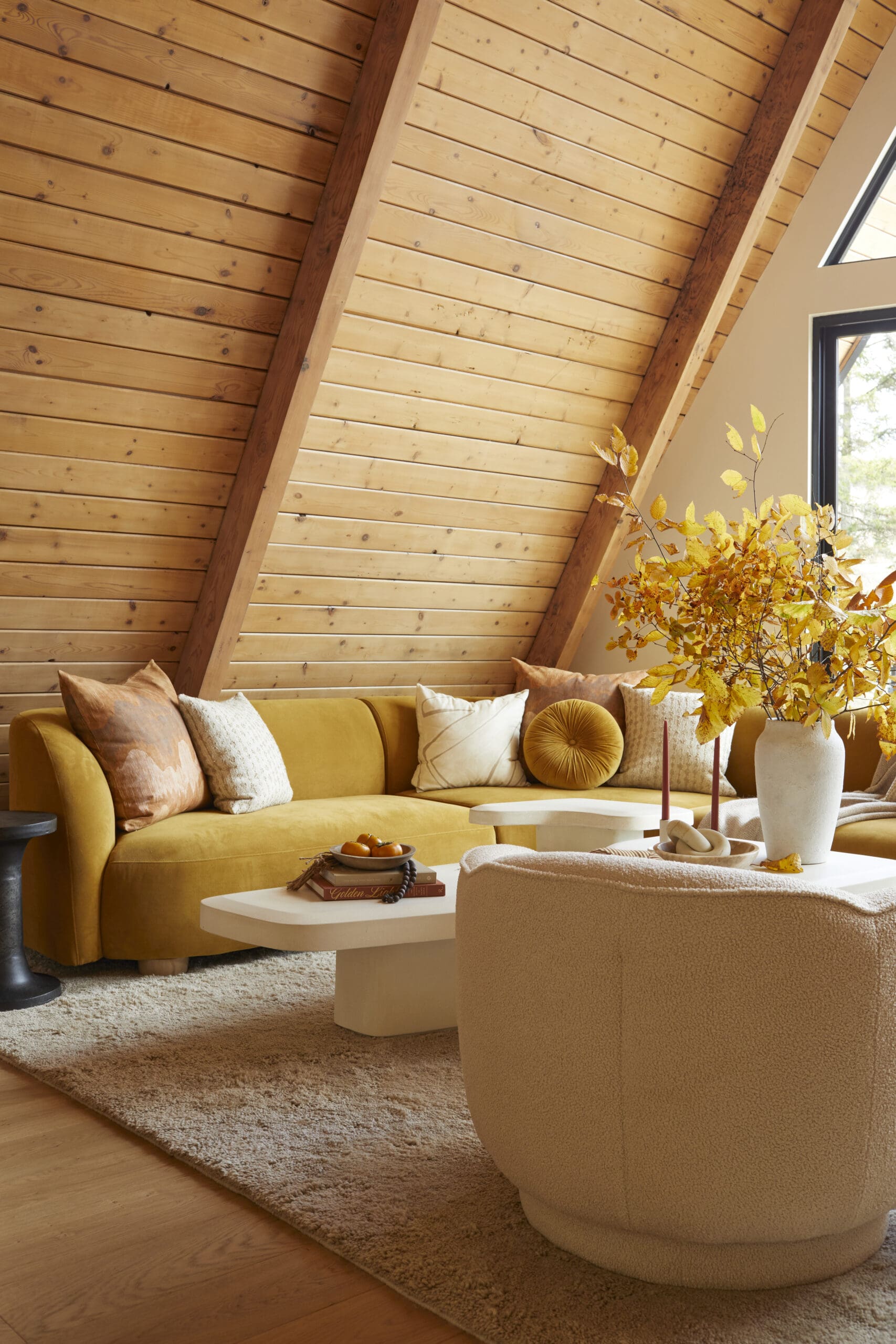 A-frame cabin with yellow sofa