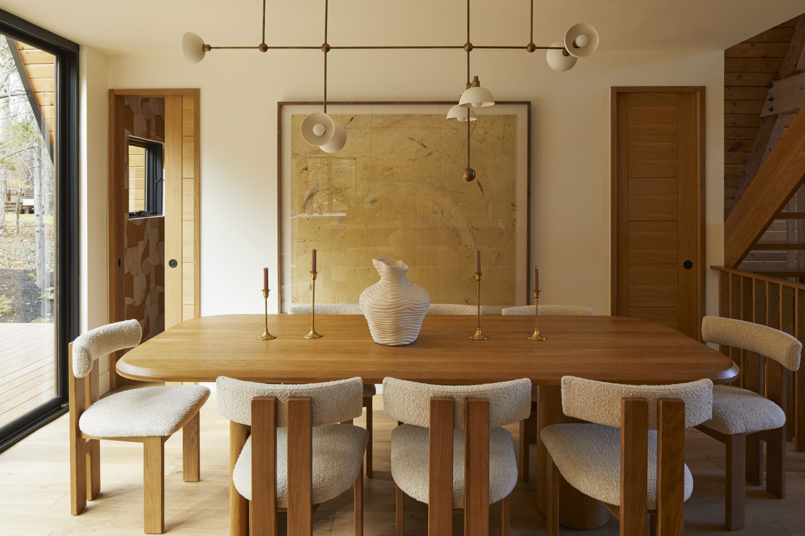 Dining room with large artwork on wall