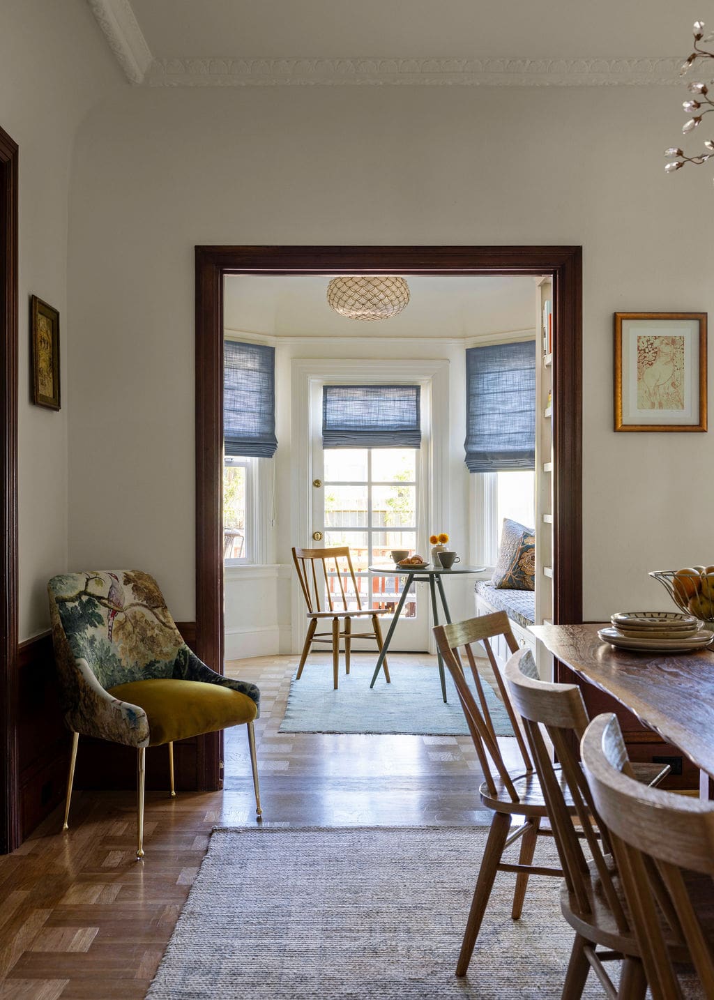 Dining room opening up to sunroom