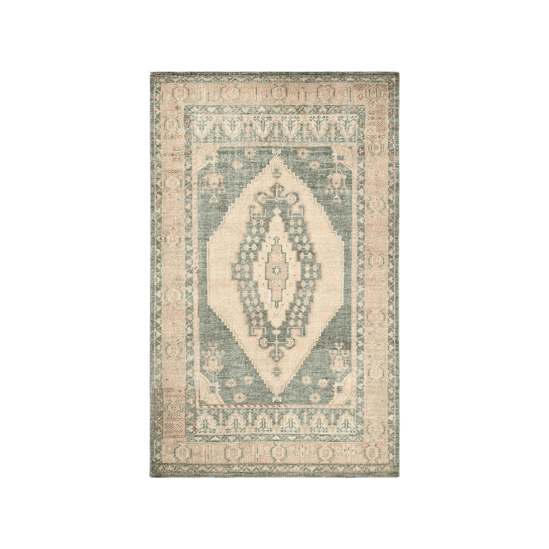 Beige and pink and blue wool rug