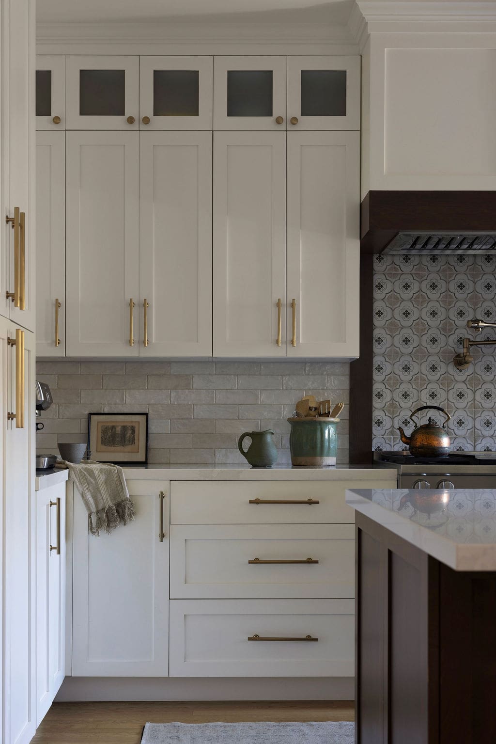 Kitchen cabinets and walnut island
