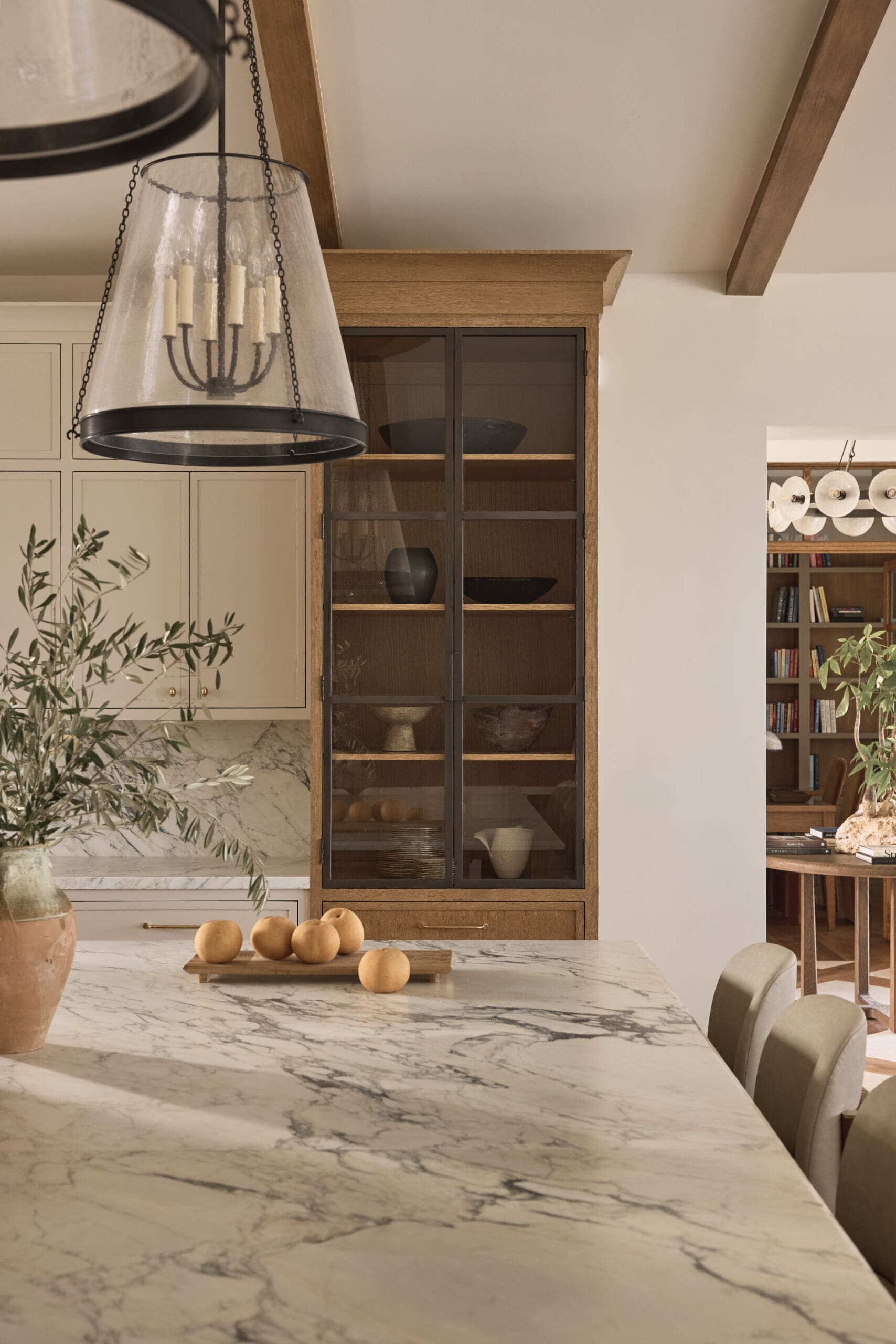 Oak shelves marble kitchen island