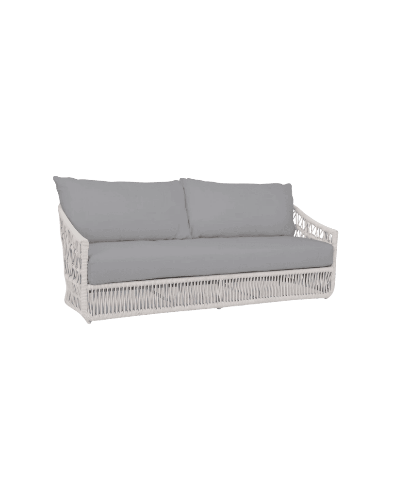 White woven wicker outdoor sofa with light gray cushions and two back pillows.