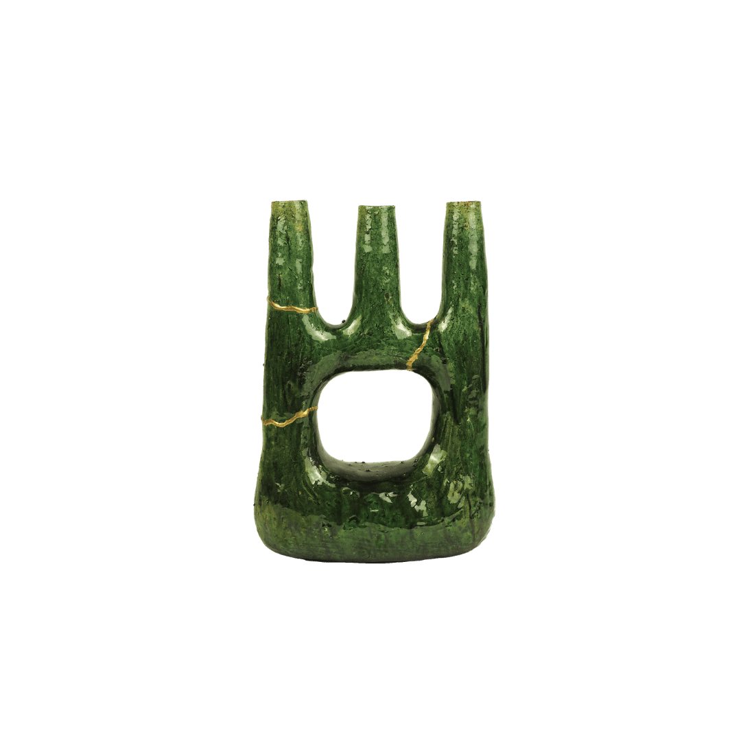 Green glazed ceramic sculpture with three prongs and a central hollow, a stylized trident-like form (kintsugi cracks in gold outlining the seams).