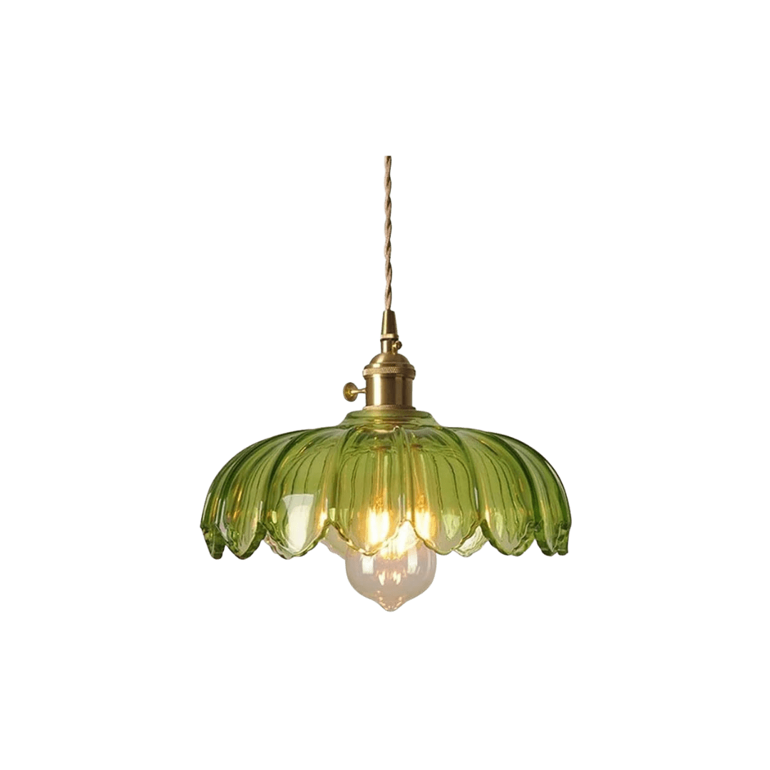 Green glass pendant lamp with brass hardware, suspended by a twisted cord and lit bulb underneath.