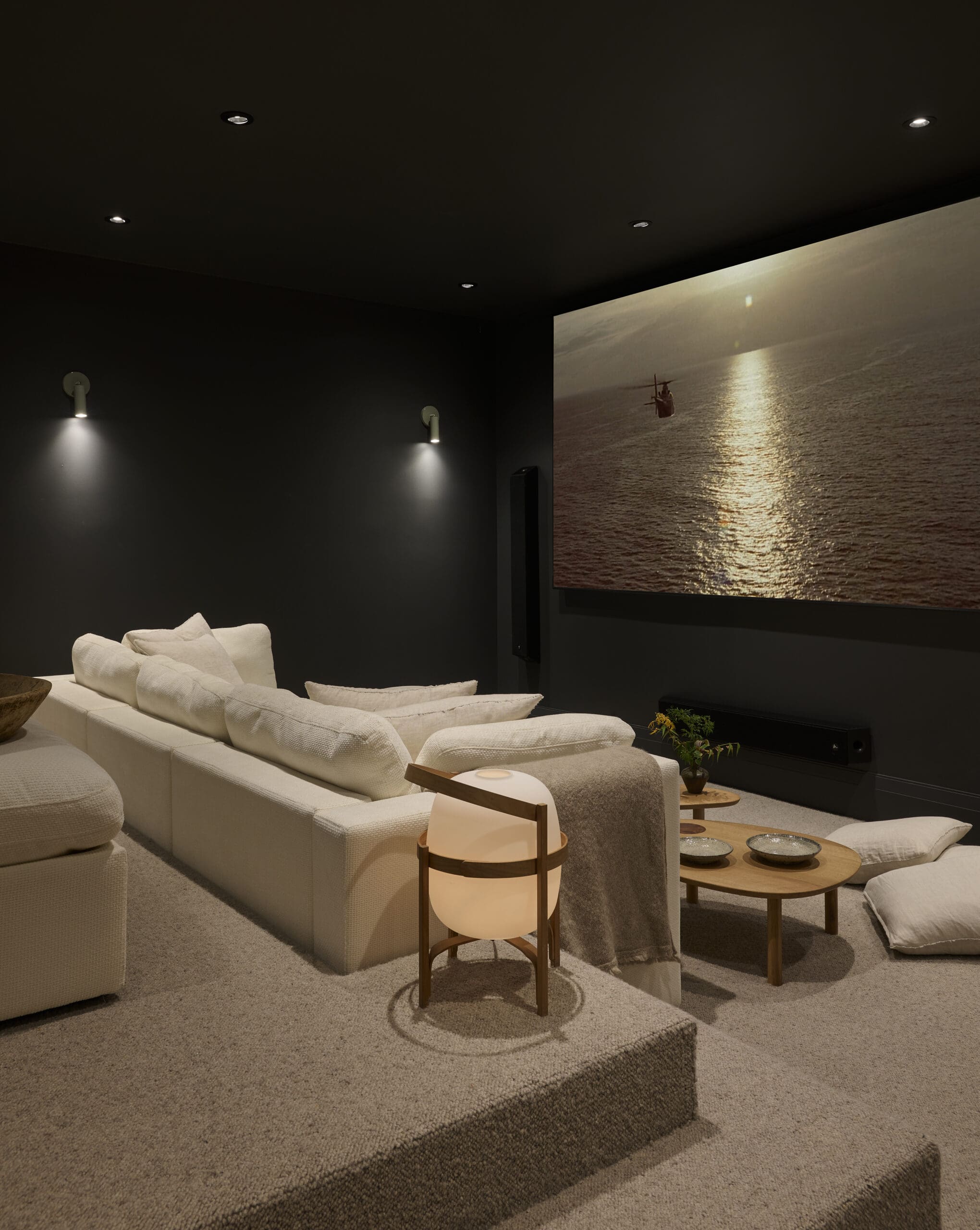 Black movie theater with white cushions