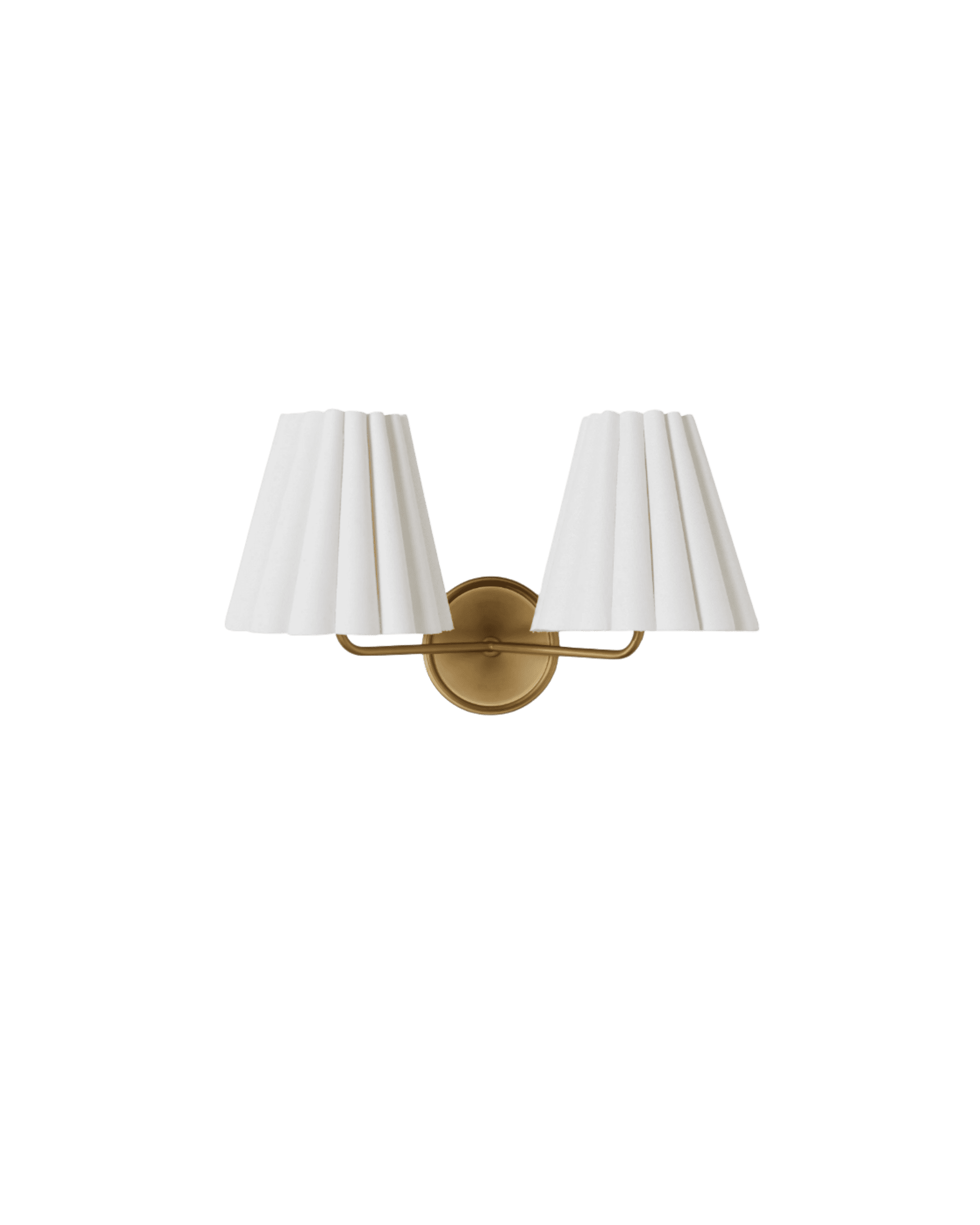 Double-arm wall sconce with two white pleated lamp shades on a brass base against a black background.