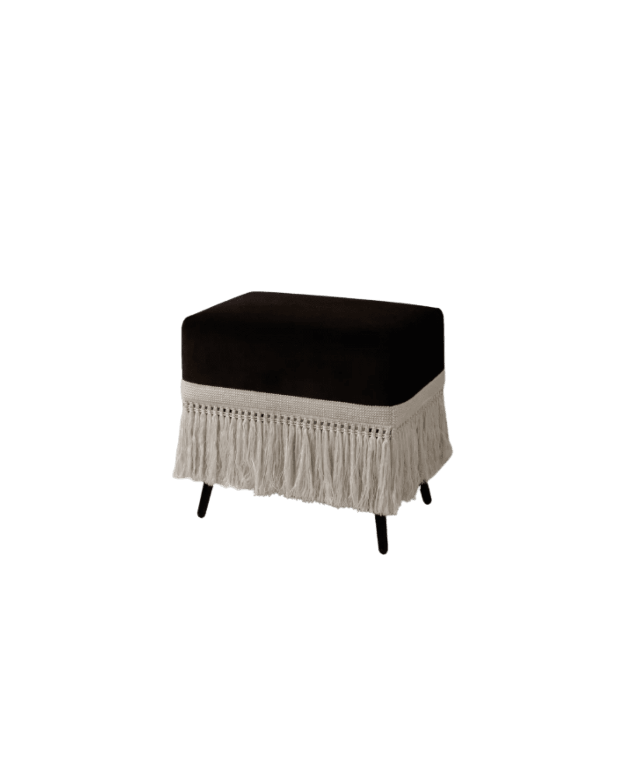 Black velvet ottoman or footstool with a dark cushioned top, fringe-style white tassel trim, and slender legs against a black background.