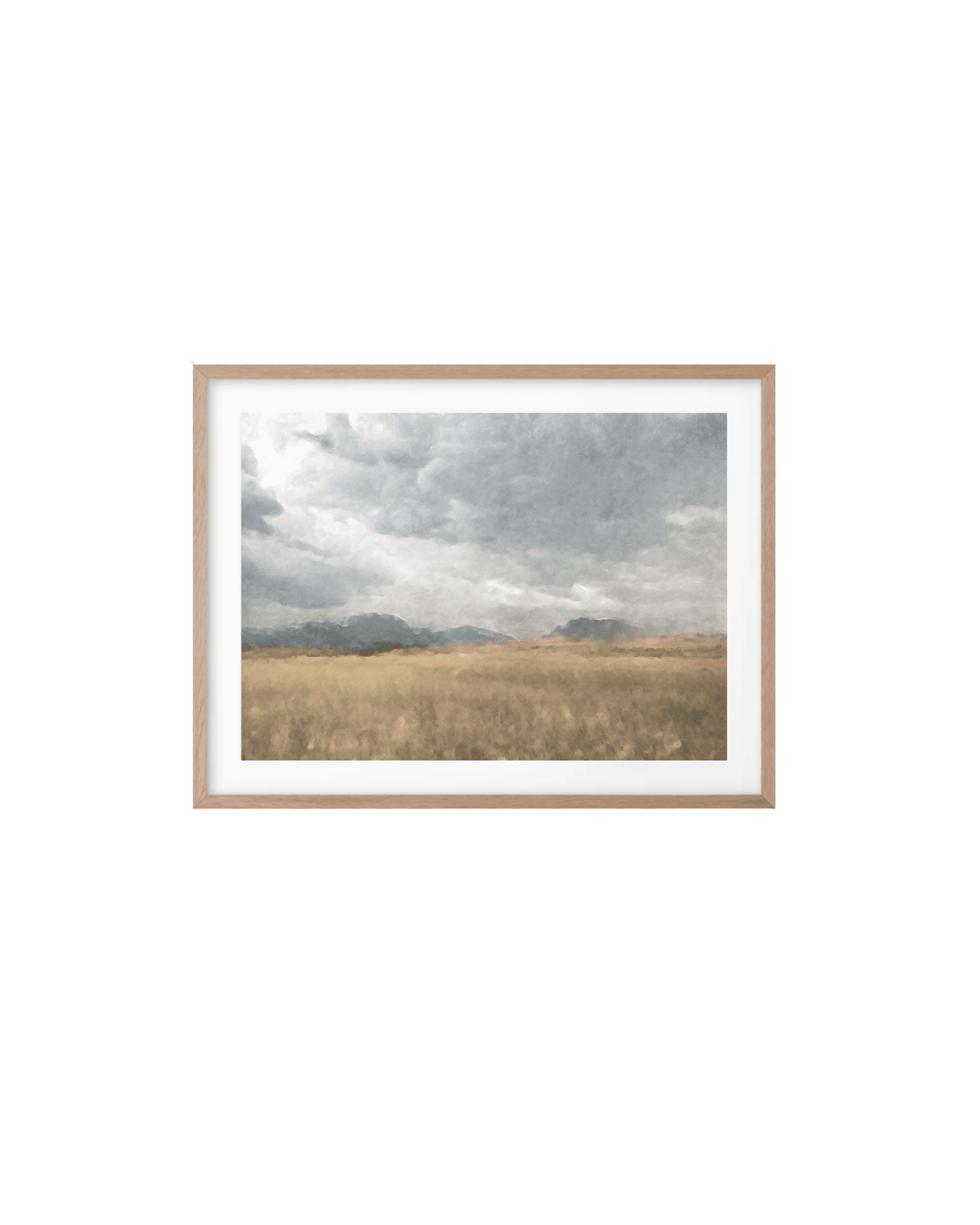 Framed landscape painting showing a cloudy sky over a grassy plain.
