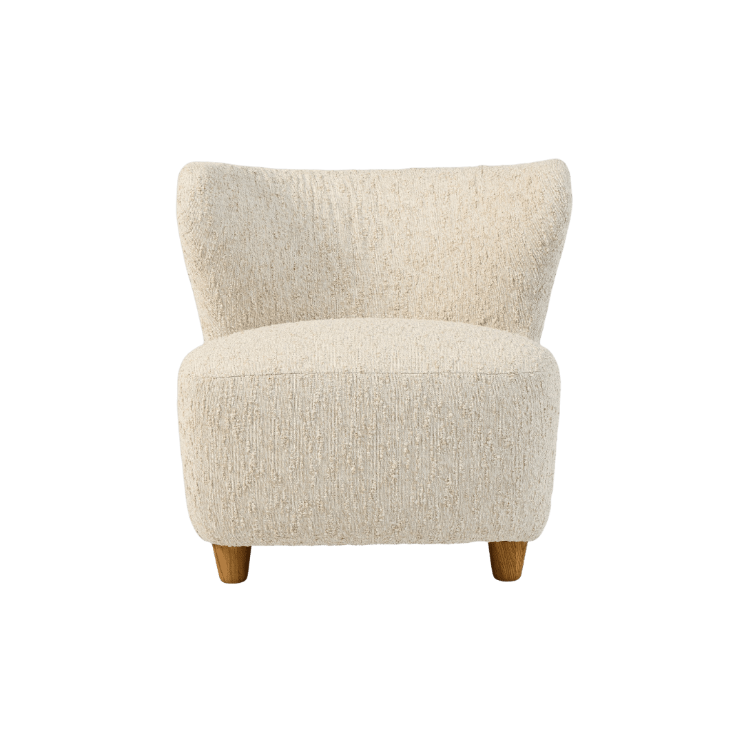 Beige boucle armchair with a curved back and short wooden legs facing forward.