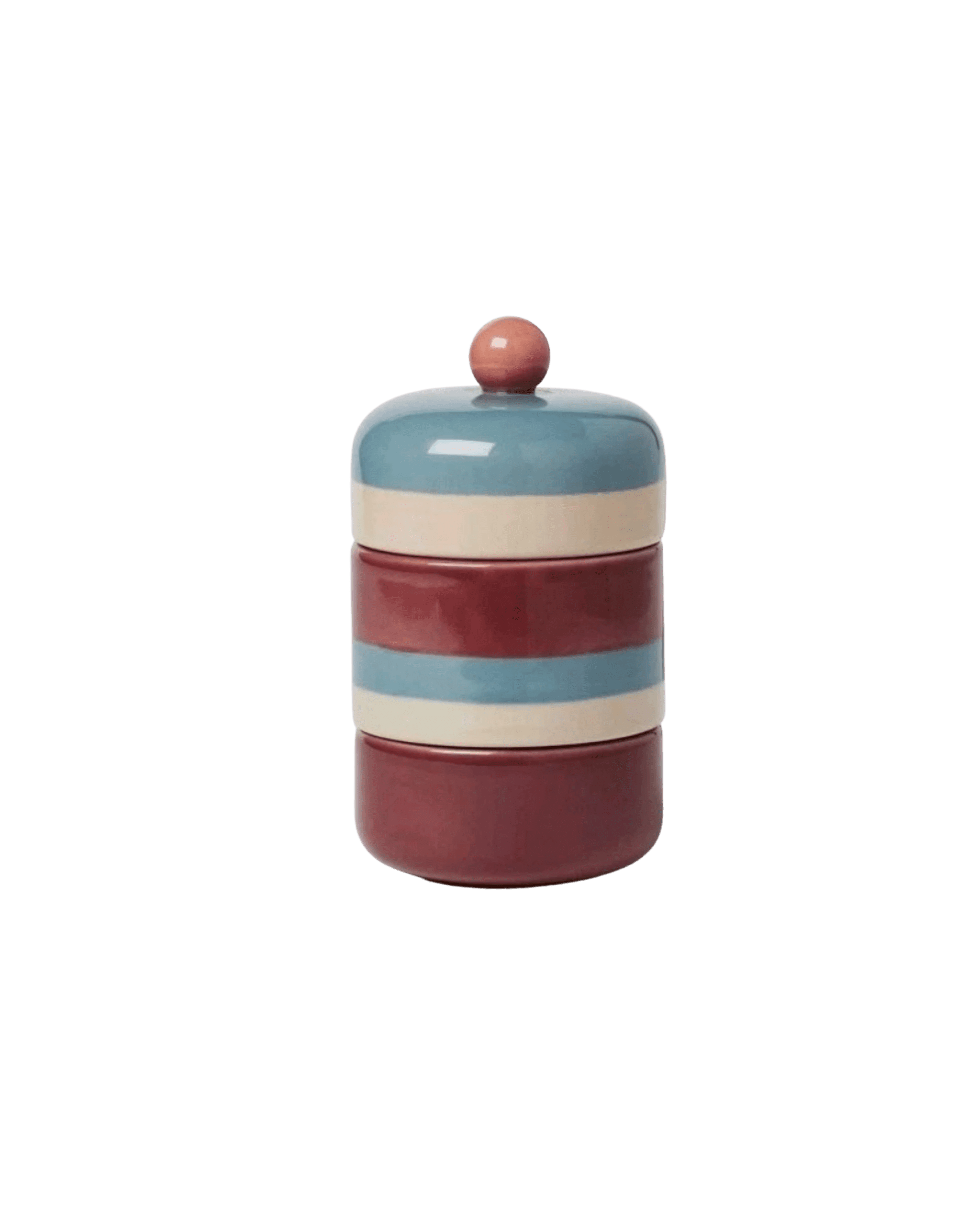 Ceramic stackable canister with a blue lid and pink knob, featuring blue, cream, and red stripes against a black background.