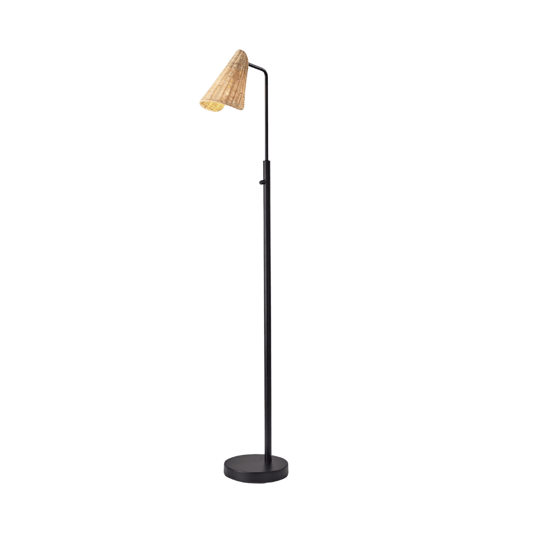 Tall black floor lamp with a curved arm and a woven wicker lampshade angled downward.