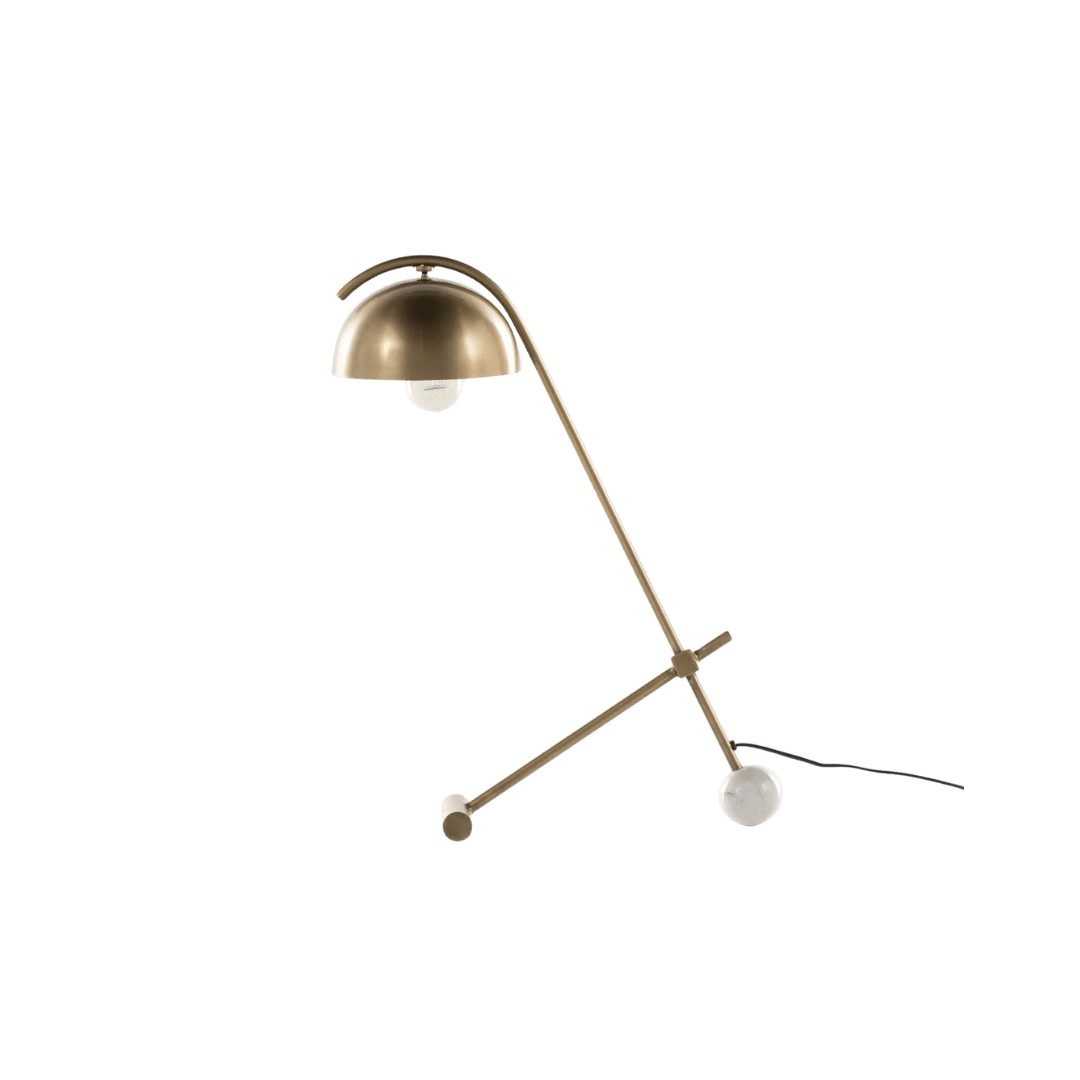 Brass adjustable desk lamp with a curved arm and tripod base, angled for task lighting