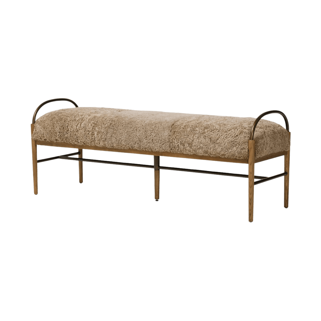 Wood-and-metal bench with a thick beige, shaggy cushion and curved metal back/arm accents