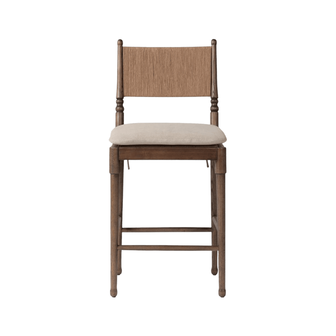 Wooden dining chair with a woven back and a beige cushioned seat.