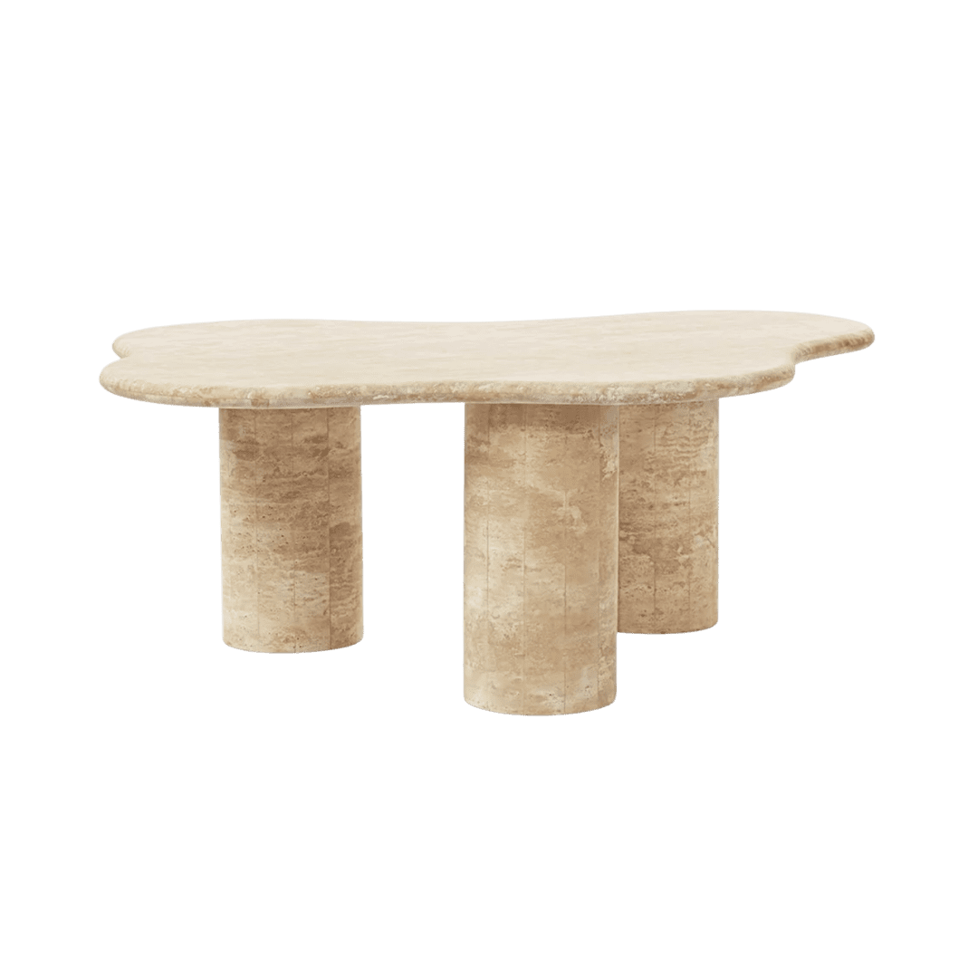 Beige curved stone table supported by three cylindrical legs.