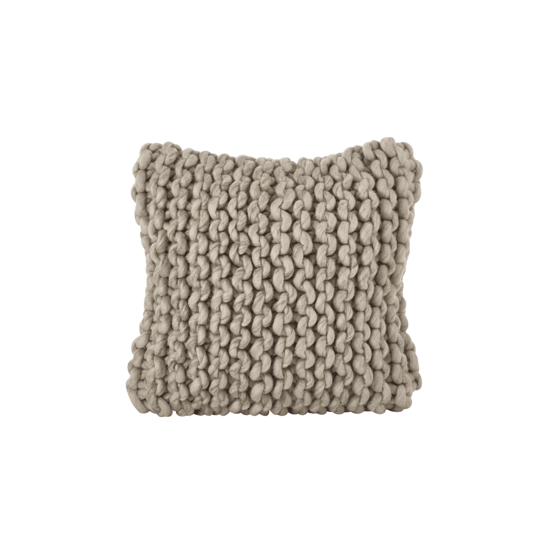 Chunky beige knitted throw pillow with thick loop stitches, square shape