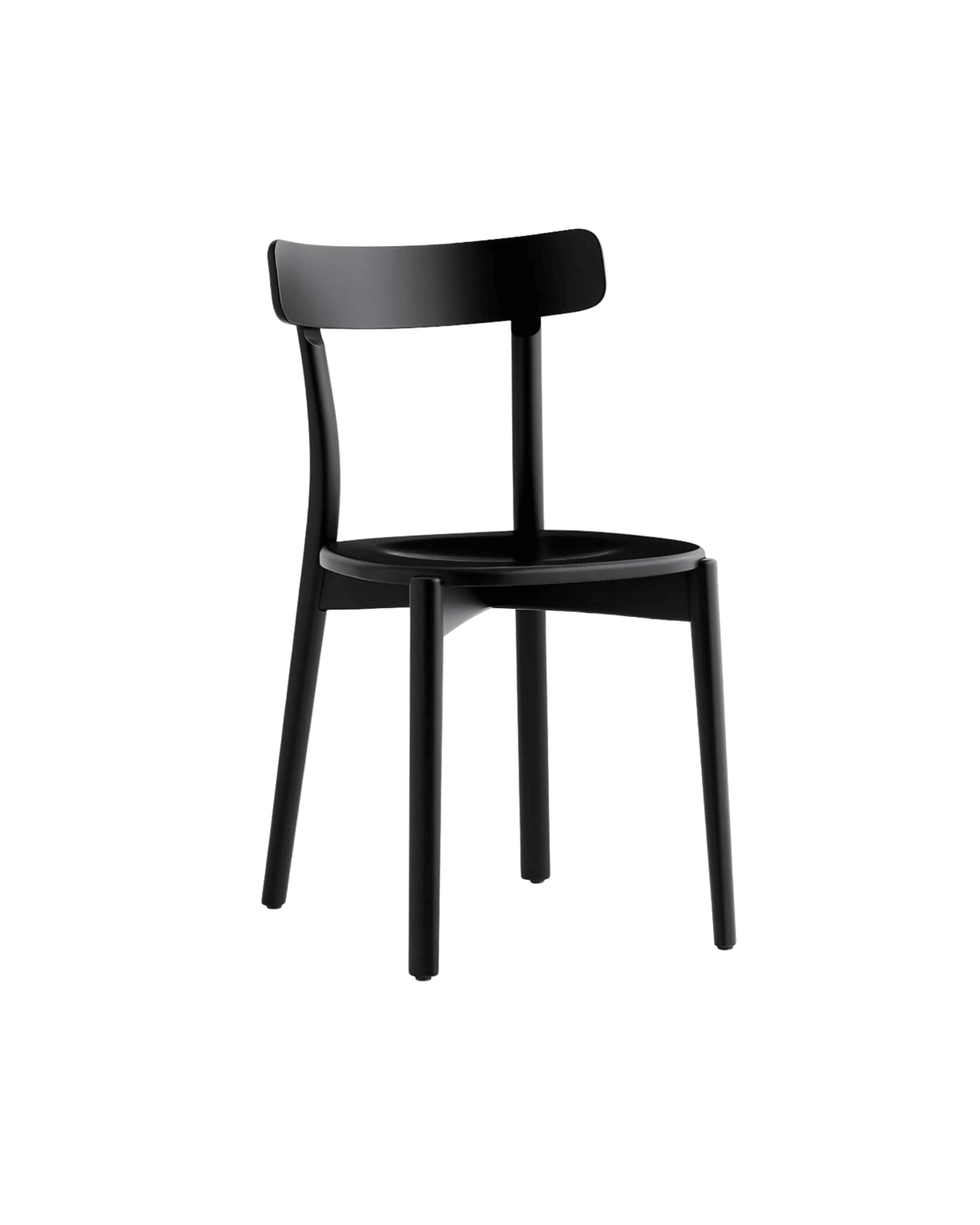 Side view of a black metal bar stool with a curved backrest against a dark background