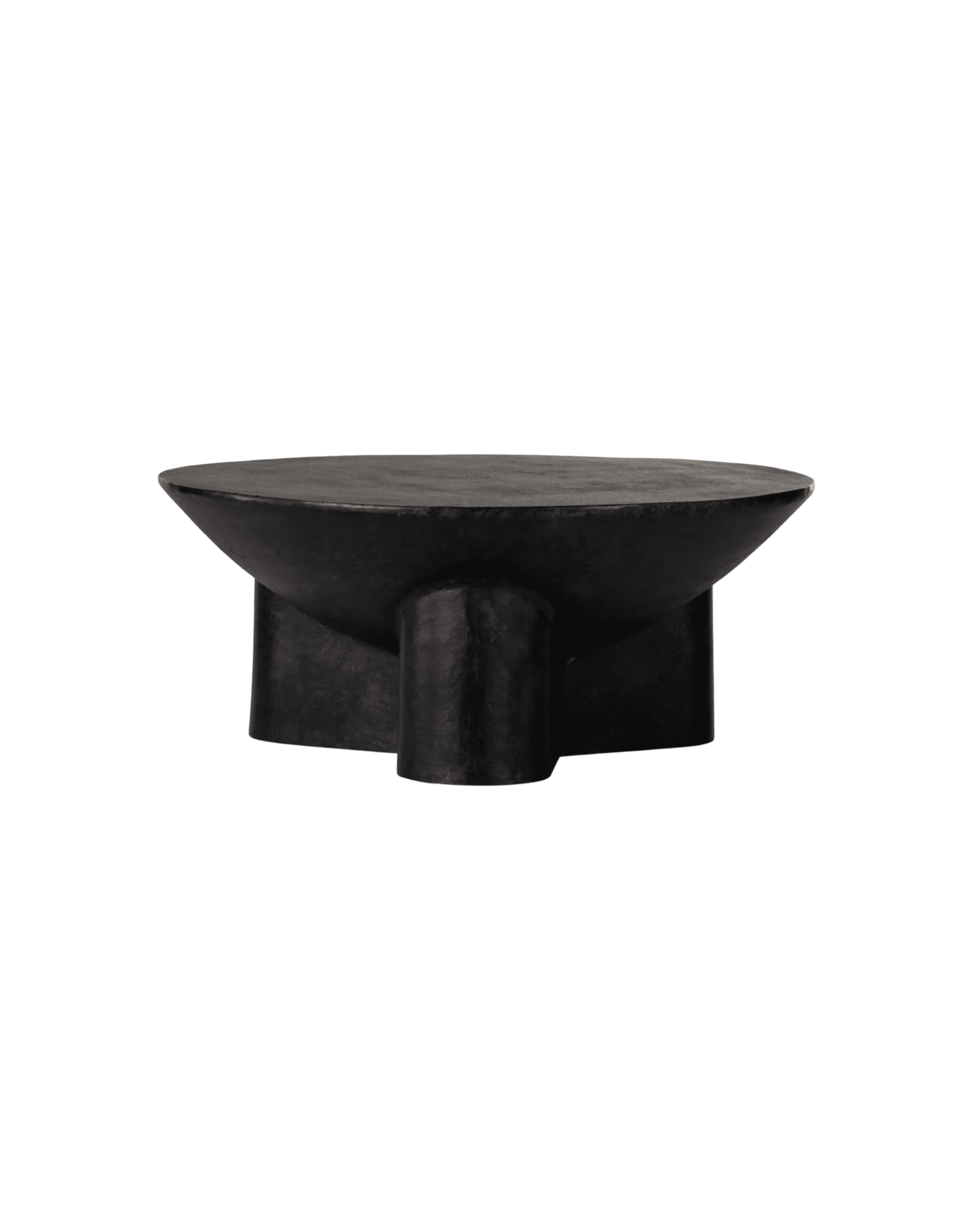 Close-up of a black circular top resting on a sturdy pedestal with vertical supports, set against a black background.