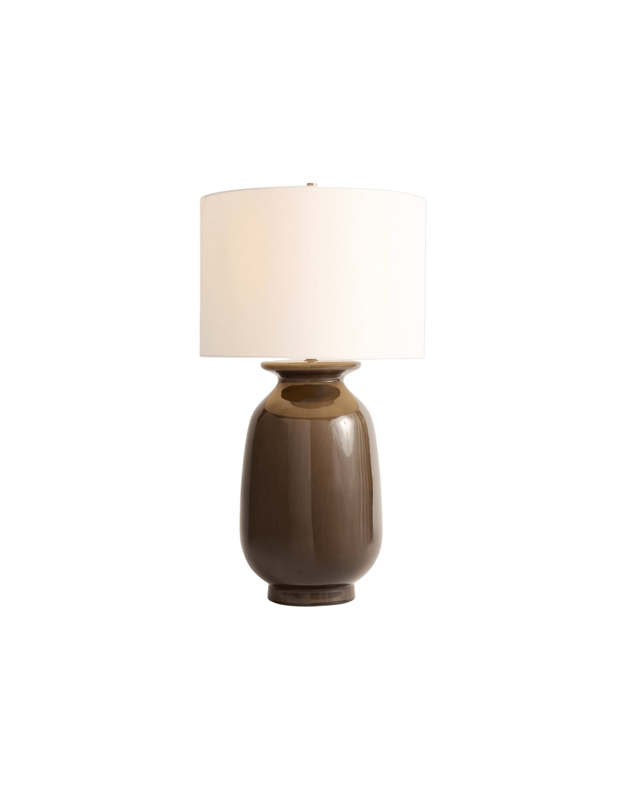 Cream lampshade atop a glossy brown ceramic base, set against a black background.