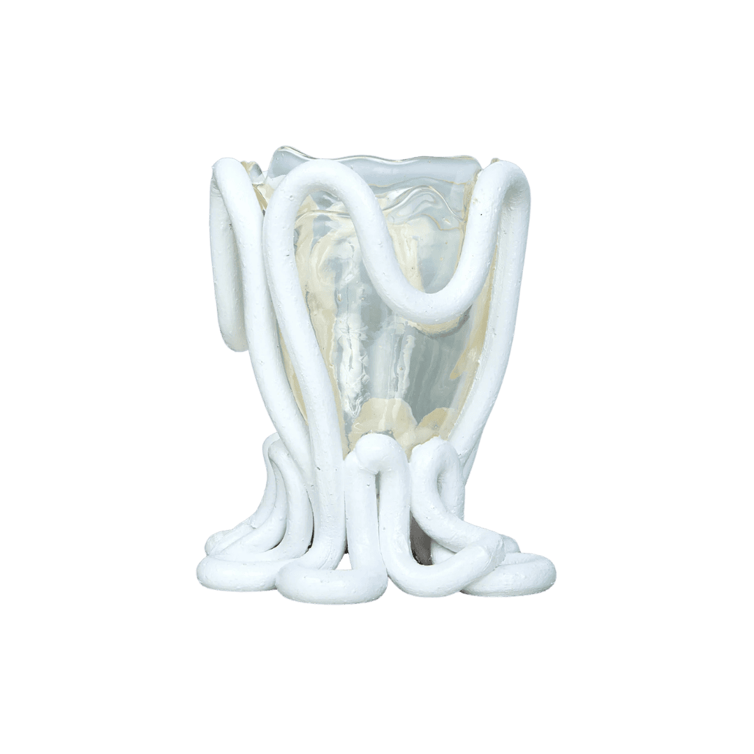 Clear dental tooth model surrounded by thick white tubing coils