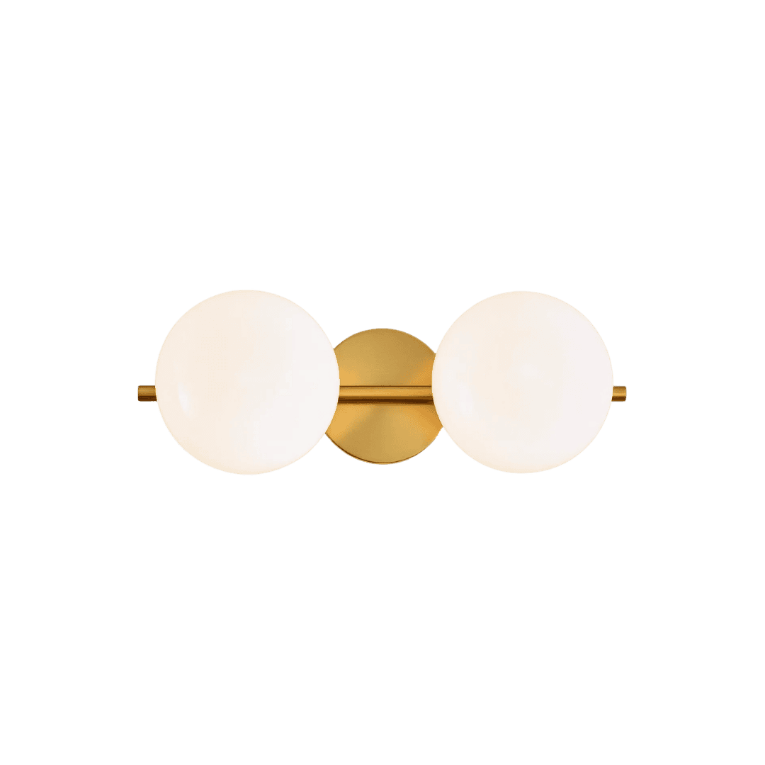 Gold wall sconce with two frosted white globe shades on a horizontal gold bar.