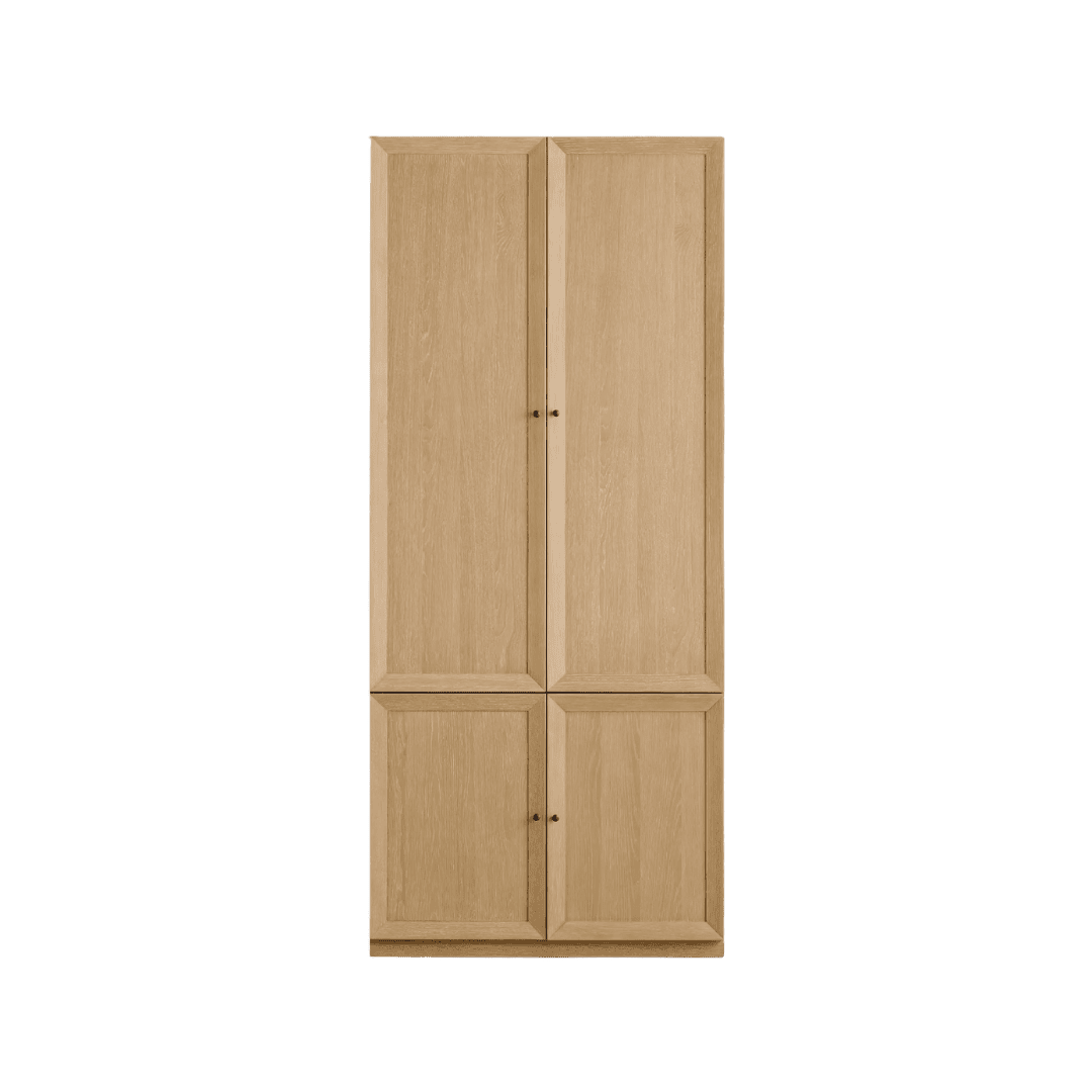 Tall wooden cabinet with four paneled doors (two-column, two-row) on a plain background.