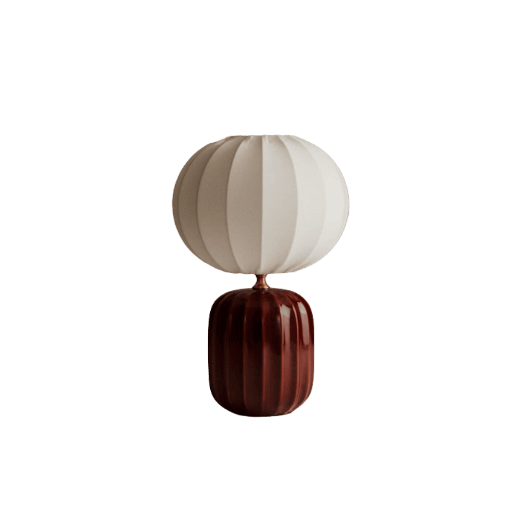 Modern table lamp with a white segmented globe shade and a glossy dark brown ribbed base on a gold stem.