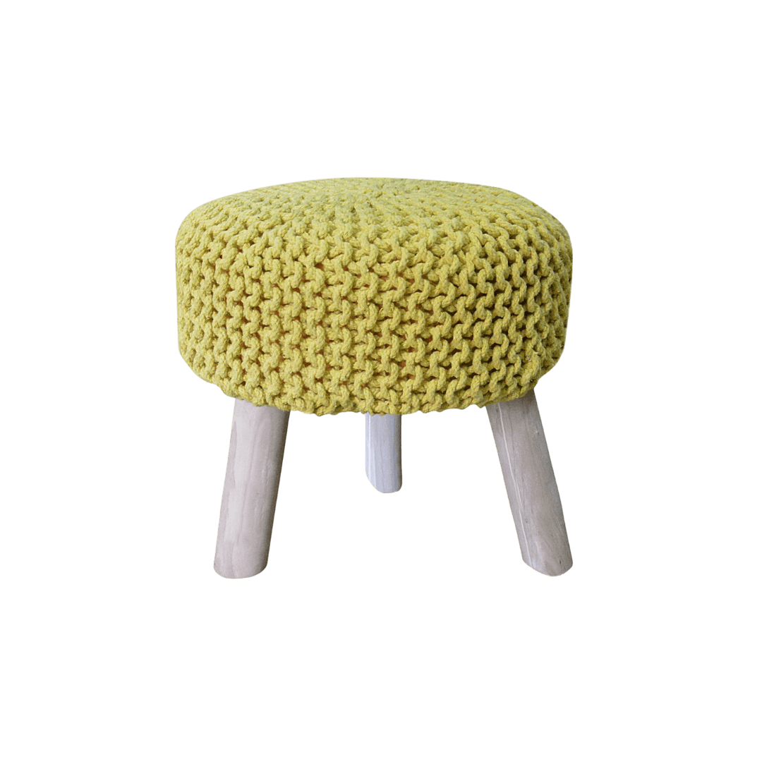 Yellow knitted pouf ottoman with light wooden legs on a solid background, modern decorative stool/seat piece.