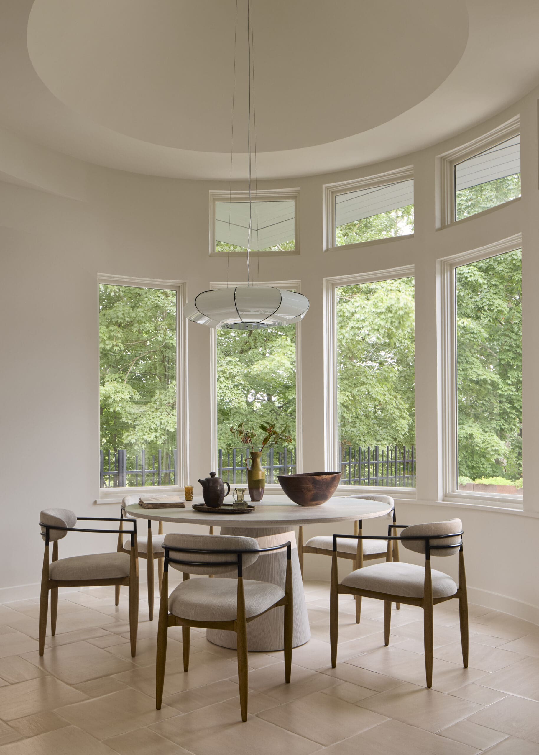 circular dining table large windows